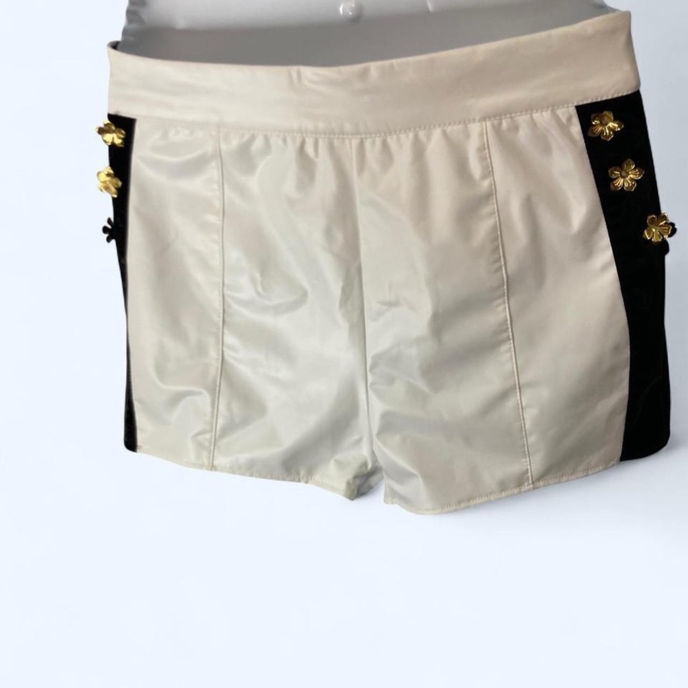 White + black shorts with gold flower details approx XS unbranded